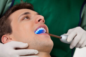 a dental implant patient being prepped for a full mouth dental implant restoration procedure.